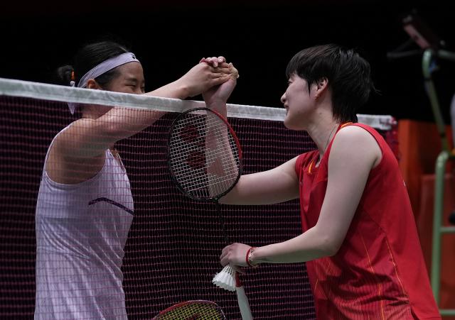 (260928) -- ICHINOMIYA, Sept. 28, 2026 (Xinhua) -- Chen Yufei (R) of China greets An Seyoung of South Korea after the women's singles semifinals of badminton at the 20th Asian Games Aichi-Nagoya 2026 in Ichinomiya of Aichi Prefecture, Japan, Sept. 28, 2026. (Xinhua/Li Bo)