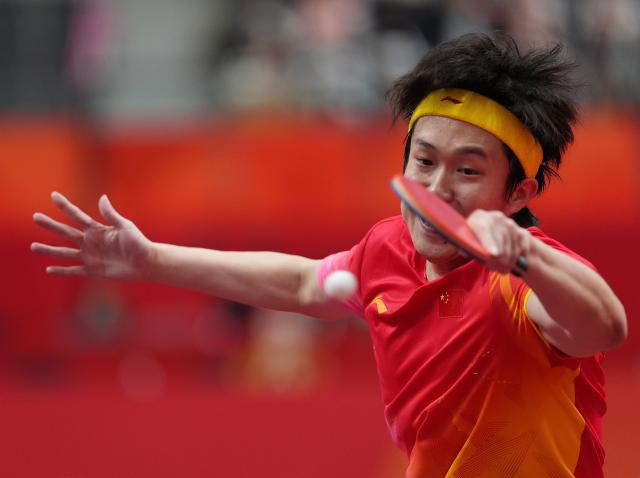 (260928) -- TOYOTA, Sept. 28, 2026 (Xinhua) -- Wang Chuqin of China competes during the men's singles semifinals of table tennis against Noshad Alamiyan of Iran at the 20th Asian Games Aichi-Nagoya 2026 in Toyota of Aichi Prefecture, Japan, Sept. 28, 2026. (Xinhua/Cheong Kam Ka)