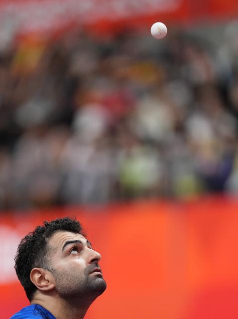 (260928) -- TOYOTA, Sept. 28, 2026 (Xinhua) -- Noshad Alamiyan of Iran competes during the men's singles semifinals of table tennis against Wang Chuqin of China at the 20th Asian Games Aichi-Nagoya 2026 in Toyota of Aichi Prefecture, Japan, Sept. 28, 2026. (Xinhua/Cheong Kam Ka)