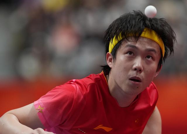 (260928) -- TOYOTA, Sept. 28, 2026 (Xinhua) -- Wang Chuqin of China serves during the men's singles semifinals of table tennis against Noshad Alamiyan of Iran at the 20th Asian Games Aichi-Nagoya 2026 in Toyota of Aichi Prefecture, Japan, Sept. 28, 2026. (Xinhua/Wang Fei)