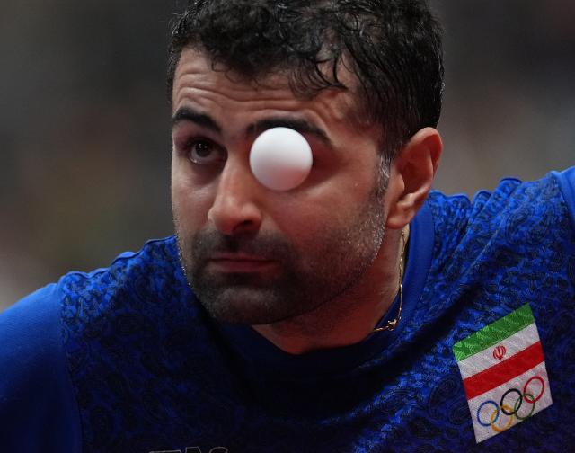 (260928) -- TOYOTA, Sept. 28, 2026 (Xinhua) -- Noshad Alamiyan of Iran competes during the men's singles semifinals of table tennis against Wang Chuqin of China at the 20th Asian Games Aichi-Nagoya 2026 in Toyota of Aichi Prefecture, Japan, Sept. 28, 2026. (Xinhua/Cheong Kam Ka)