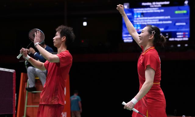 (260928) -- ICHINOMIYA, Sept. 28, 2026 (Xinhua) -- Jiang Zhenbang (L)/Wei Yaxin of China celebrate after the mixed doubles semifinals of badminton against Ye Hong-wei/Chan Nicole Gonzales of Chinese Taipei at the 20th Asian Games Aichi-Nagoya 2026 in Ichinomiya of Aichi Prefecture, Japan, Sept. 28, 2026. (Xinhua/Li Bo)