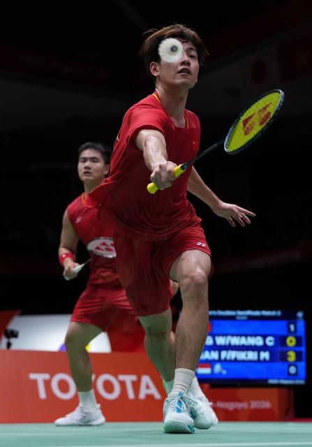 (260928) -- ICHINOMIYA, Sept. 28, 2026 (Xinhua) -- Liang Weikeng/Wang Chang (front) of China compete during the men's doubles semifinals of badminton against Fajar Alfian/Muhammad Shohibul Fikri of Indonesia at the 20th Asian Games Aichi-Nagoya 2026 in Ichinomiya of Aichi Prefecture, Japan, Sept. 28, 2026. (Xinhua/Li Bo)
