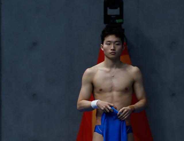 (260928) -- TOKYO, Sept. 28, 2026 (Xinhua) -- Wang Zongyuan of China reacts during the men's 1m springboard final of diving at the 20th Asian Games Aichi-Nagoya 2026 in Tokyo, Japan, Sept. 28, 2026. (Xinhua/Wu Zhizun)