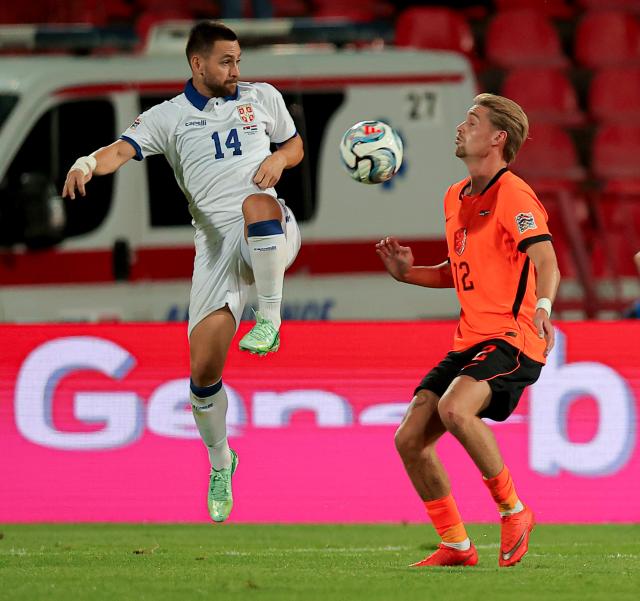 (260928) -- BELGRADE, Sept. 28, 2026 (Xinhua) -- Serbia's Andrija Zivkovic (L) vies with the Netherlands' Kenneth Taylor during the UEFA Nations League 2026/27 League A Group A match between Serbia and the Netherlands in Belgrade, Serbia, Sept. 27, 2026. (Photo by Predrag Milosavljevic/Xinhua)