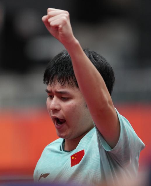 (260928) -- TOYOTA, Sept. 28, 2026 (Xinhua) -- Lin Shidong of China celebrates during the men's singles semifinals of table tennis against Lin Yun-ju of Chinese Taipei at the 20th Asian Games Aichi-Nagoya 2026 in Toyota of Aichi Prefecture, Japan, Sept. 28, 2026. (Xinhua/Wang Fei)