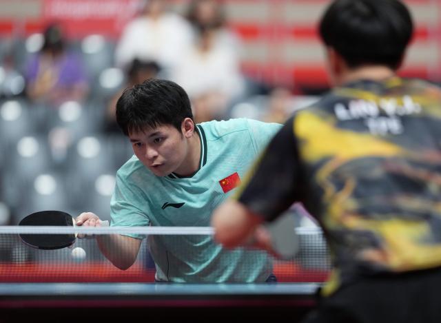(260928) -- TOYOTA, Sept. 28, 2026 (Xinhua) -- Lin Shidong (L) of China competes during the men's singles semifinals of table tennis against Lin Yun-ju of Chinese Taipei at the 20th Asian Games Aichi-Nagoya 2026 in Toyota of Aichi Prefecture, Japan, Sept. 28, 2026. (Xinhua/Wang Fei)