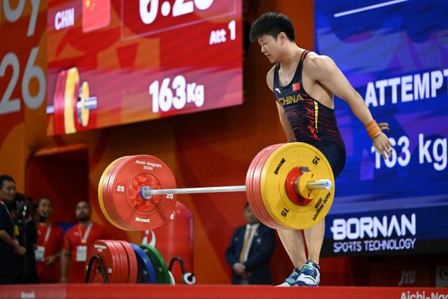 (260928) -- NAGOYA, Sept. 28, 2026 (Xinhua) -- Chen Shunnan of China competes during the men's 85kg final of weightlifting at the 20th Asian Games Aichi-Nagoya 2026 in Nagoya, Japan, Sept. 28, 2026. (Xinhua/Yu Yang)