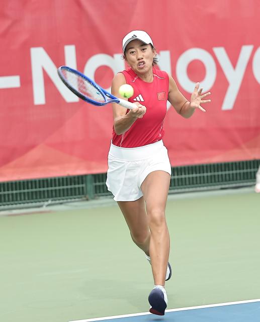 (260928) -- NAGOYA, Sept. 28, 2026 (Xinhua) -- Zhang Shuai of China hits a return during the women's singles second round match of tennis against Meshkatolzahra Safi of Iran at the 20th Asian Games Aichi-Nagoya 2026 in Nagoya, Japan, Sept. 28, 2026. (Xinhua/Long Lei)