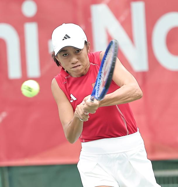 (260928) -- NAGOYA, Sept. 28, 2026 (Xinhua) -- Zhang Shuai of China hits a return during the women's singles second round match of tennis against Meshkatolzahra Safi of Iran at the 20th Asian Games Aichi-Nagoya 2026 in Nagoya, Japan, Sept. 28, 2026. (Xinhua/Long Lei)