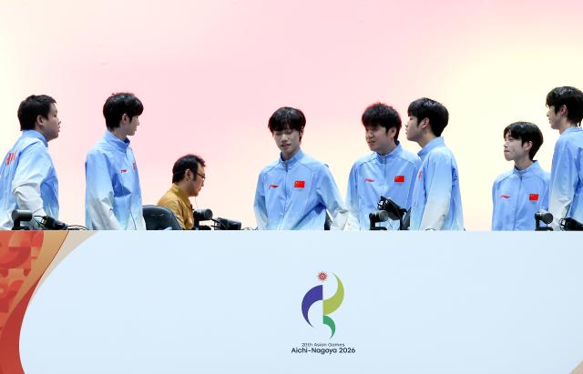(260928) -- TOKONAME, Sept. 28, 2026 (Xinhua) -- Team China react after the Honor of Kings final of Esports between team China and team Malaysia at the 20th Asian Games Aichi-Nagoya 2026 in Tokoname of Aichi Prefecture, Japan, Sept. 28, 2026. (Xinhua/Yao Qilin)
