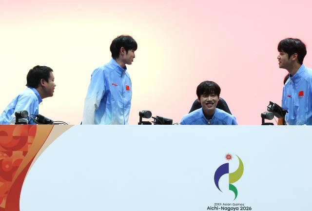 (260928) -- TOKONAME, Sept. 28, 2026 (Xinhua) -- Team China react after the Honor of Kings final of Esports between team China and team Malaysia at the 20th Asian Games Aichi-Nagoya 2026 in Tokoname of Aichi Prefecture, Japan, Sept. 28, 2026. (Xinhua/Yao Qilin)