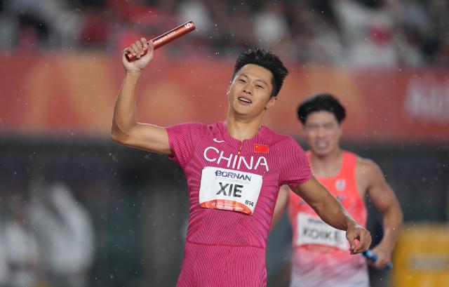 (260928) -- NAGOYA, Sept. 28, 2026 (Xinhua) -- Xie Zhenye of Team China celebrates after the men's 4x100m relay final of athletics at the 20th Asian Games Aichi-Nagoya 2026 in Nagoya, Japan, Sept. 28, 2026. (Xinhua/Jia Yuchen)