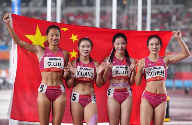 (260928) -- NAGOYA, Sept. 28, 2026 (Xinhua) -- Liu Guoyi, Liang Xiaojing, Liu Xiajun and Chen Yujie (from L to R) of Team China pose for photo after the women's 4x100M relay final of Athletics at the 20th Asian Games Aichi-Nagoya 2026 in Nagoya, Japan, Sept. 28, 2026. (Xinhua/Lui Siu Wai)