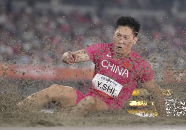 (260928) -- NAGOYA, Sept. 28, 2026 (Xinhua) -- Shi Yuhao of China competes during the men's long jump final of Athletics at the 20th Asian Games Aichi-Nagoya 2026 in Nagoya, Japan, Sept. 28, 2026. (Xinhua/Luo Yuan)