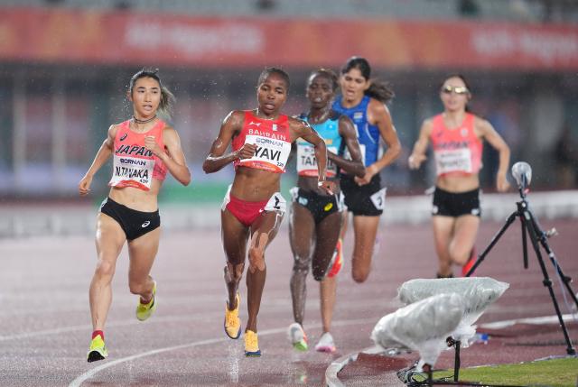 (260928) -- NAGOYA, Sept. 28, 2026 (Xinhua) -- Winfred Yavi (2nd L) of Bahrain, Tanaka Nozomi (1st L) of Japan compete during the women's 5000m final match of Athletics at the 20th Asian Games Aichi-Nagoya 2026 in Nagoya, Japan, Sept. 28, 2026. (Xinhua/Jia Yuchen)