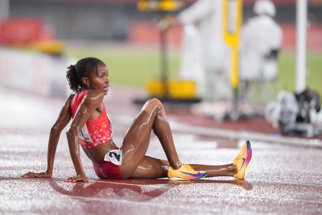 (260928) -- NAGOYA, Sept. 28, 2026 (Xinhua) -- Winfred Yavi of Bahrain reacts after the women's 5000m final match of Athletics at the 20th Asian Games Aichi-Nagoya 2026 in Nagoya, Japan, Sept. 28, 2026. (Xinhua/Lui Siu Wai)