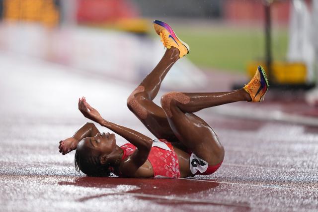 (260928) -- NAGOYA, Sept. 28, 2026 (Xinhua) -- Winfred Yavi of Bahrain reacts after the women's 5000m final match of Athletics at the 20th Asian Games Aichi-Nagoya 2026 in Nagoya, Japan, Sept. 28, 2026. (Xinhua/Lui Siu Wai)