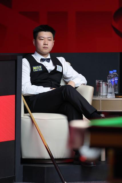 (260928) -- SHENZHEN, Sept. 28, 2026 (Xinhua) -- Zhao Xintong reacts during the round 2 match between Scott Donaldson of Scotland and Zhao Xintong of China at World Snooker Tour Shenzhen Open 2026 in Shenzhen, south China's Guangdong Province, Sept. 28, 2026. (Xinhua/Liang Xu)