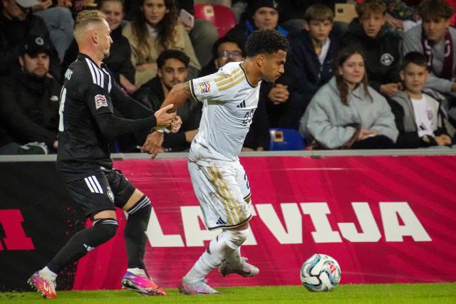 (260929) -- RIGA, Sept. 29, 2026 (Xinhua) -- Latvian player Andrejs Ciganiks (L) vies with Marcus Edwards of Cyprus during the League C match of UEFA Nations League between Latvia and Cyprus in Riga, Latvia, Sept. 28, 2026. (Photo by Edijs Palens/Xinhua)