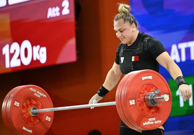 (260929) -- NAGOYA, Sept. 29, 2026 (Xinhua) -- Alina Marushchak of Bahrain reacts during the women's 86kg final of weightlifting at the 20th Asian Games Aichi-Nagoya 2026 in Nagoya, Japan, Sept. 29, 2026. (Xinhua/Yu Yang)