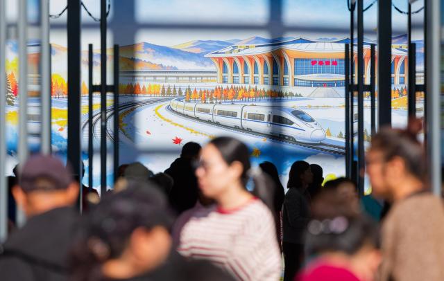 (260929) -- BEIJING, Sept. 29, 2026 (Xinhua) -- People visit the Yichunxi Railway Station of the Harbin-Yichun high-speed railway in Yichun, northeast China's Heilongjiang Province, Sept. 28, 2026. China's northernmost high-speed railway, running through a region of discontinuous permafrost in northeast China's Heilongjiang Province, officially entered service on Monday. (Xinhua/Zhang Tao)