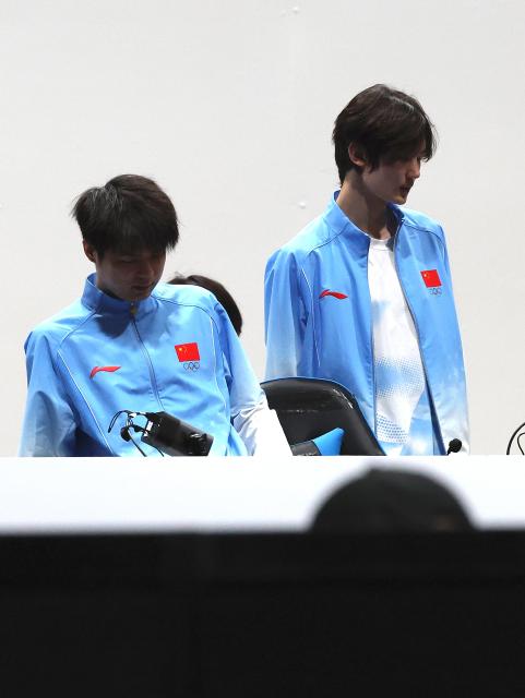 (260929) -- TOKONAME, Sept. 29, 2026 (Xinhua) -- Liu Jinshan (L) and He Jianghong of team China react in a break during the Battle Royale [PUBG MOBILE - Asian Games Version] finals of Esports at the 20th Asian Games Aichi-Nagoya 2026 in Tokoname of Aichi Prefecture, Japan, Sept. 29, 2026. (Xinhua/Yao Qilin)