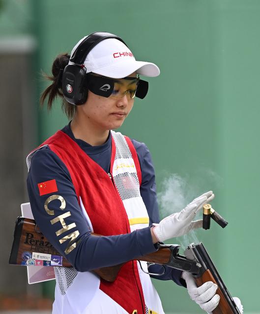 (260929) -- TOYOTA, Sept. 29, 2026 (Xinhua) -- Liu Shanshan of team China reacts during the trap women team final of shooting at the 20th Asian Games Aichi-Nagoya 2026 in Toyota of Aichi Prefecture, Japan, Sept. 29, 2026. (Xinhua/Liu Lei)