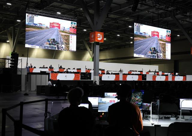 (260929) -- TOKONAME, Sept. 29, 2026 (Xinhua) -- Players compete during the Battle Royale [PUBG MOBILE - Asian Games Version] finals of Esports at the 20th Asian Games Aichi-Nagoya 2026 in Tokoname of Aichi Prefecture, Japan, Sept. 29, 2026. (Xinhua/Yao Qilin)