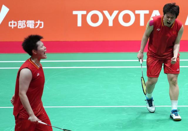 (260929) -- ICHINOMIYA, Sept. 29, 2026 (Xinhua) -- Liu Shengshu/Tan Ning (R) of China celebrate during the women's doubles final of badminton against Lee Sohee/Baek Hana of South Korea at the 20th Asian Games Aichi-Nagoya 2026 in Ichinomiya of Aichi Prefecture, Japan, Sept. 29, 2026. (Xinhua/Cheong Kam Ka)