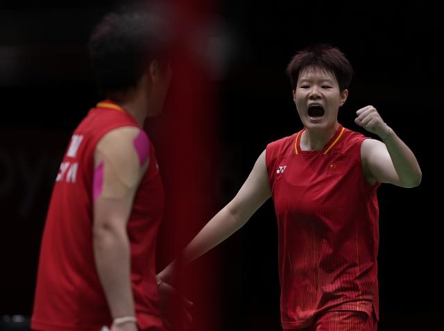(260929) -- ICHINOMIYA, Sept. 29, 2026 (Xinhua) -- Liu Shengshu (R)/Tan Ning of China celebrate during the women's doubles final of badminton against Lee Sohee/Baek Hana of South Korea at the 20th Asian Games Aichi-Nagoya 2026 in Ichinomiya of Aichi Prefecture, Japan, Sept. 29, 2026. (Xinhua/Li Bo)