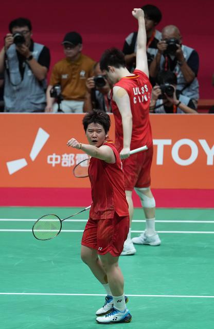 (260929) -- ICHINOMIYA, Sept. 29, 2026 (Xinhua) -- Liu Shengshu/Tan Ning (front) of China celebrate during the women's doubles final of badminton against Lee Sohee/Baek Hana of South Korea at the 20th Asian Games Aichi-Nagoya 2026 in Ichinomiya of Aichi Prefecture, Japan, Sept. 29, 2026. (Xinhua/Cheong Kam Ka)