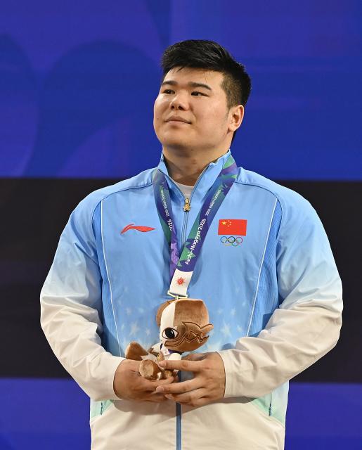 (260929) -- NAGOYA, Sept. 29, 2026 (Xinhua) -- Bronze medalist Liu Huanhua of China reacts during the victory ceremony for the men's 110kg of weightlifting at the 20th Asian Games Aichi-Nagoya 2026 in Nagoya, Japan, Sept. 29, 2026. (Xinhua/Yu Yang)