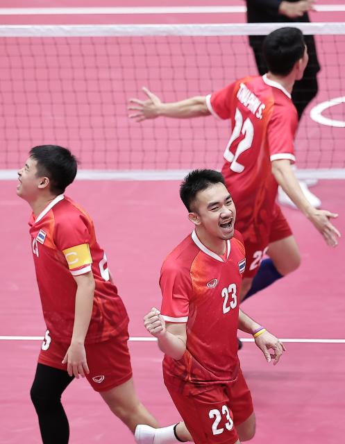 (260929) -- NAGOYA, Sept. 29, 2026 (Xinhua) -- Tanaphon Sapyen (R, top), Wuttinun Kamsanor (L) and Kritsanapong Nontakote of team Thailand celebrate during the men's regu gold medal match of sepaktakraw between team Thailand and team Malaysia at the 20th Asian Games Aichi-Nagoya 2026 in Nagoya, Japan, Sept. 29, 2026. (Xinhua/Long Lei)
