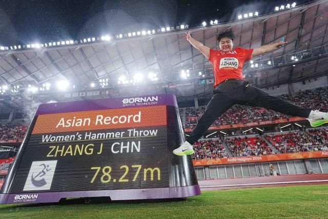 (260929) -- NAGOYA, Sept. 29, 2026 (Xinhua) -- Zhang Jiale of China celebrates with the new Asian record she set after the women's hammer throw final of Athletics at the 20th Asian Games Aichi-Nagoya 2026 in Nagoya, Japan, Sept. 29, 2026. (Xinhua/Luo Yuan)