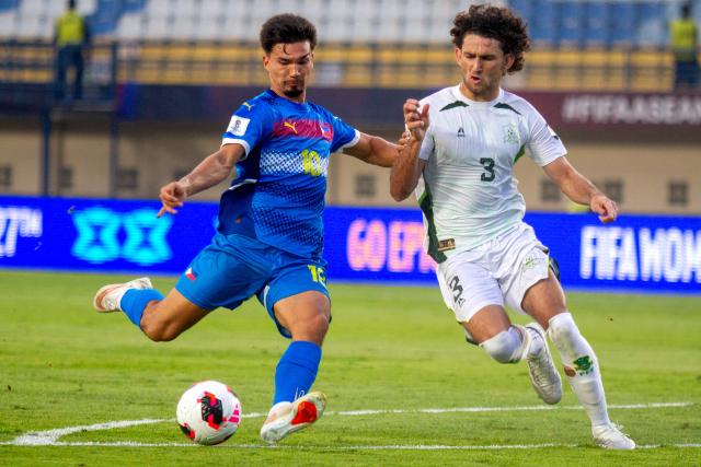 (260929) -- BANDUNG, Sept. 29, 2026 (Xinhua) -- Bjorn Kristensen (L) of the Philippines vies with Mohib Ullah of Pakistan during the FIFA ASEAN Cup 2026 Division 1 Group B match between the Philippines and Pakistan in Si Jalak Harupat Stadium, Bandung, West Java, Indonesia, Sept. 29, 2026. (Photo by Septianjar Muharam/Xinhua)