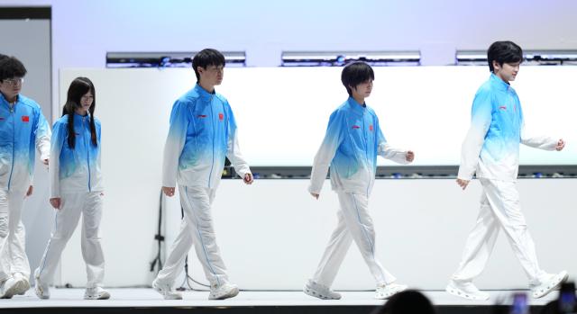 (260930) -- TOKONAME, Sept. 30, 2026 (Xinhua) -- Players of team China arrive at the venue ahead of the quarterfinals between team China and team South Korea of the 1v4 asymmetrical survival game [Identity V - Asian Games Version] of Esports at the 20th Asian Games Aichi-Nagoya 2026 in Tokoname of Aichi Prefecture, Japan, Sept. 30, 2026. (Xinhua/Wang Fei)