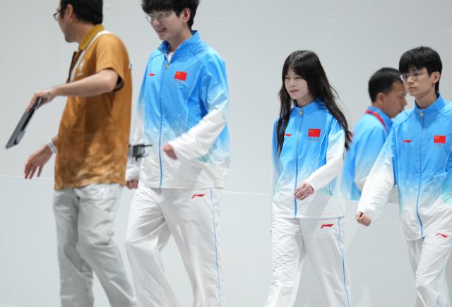 (260930) -- TOKONAME, Sept. 30, 2026 (Xinhua) -- Team China enter the venue during the Quarterfinals between team China and team South Korea of 1v4 asymmetrical survival game [Identity V - Asian Games Version] of Esports at the 20th Asian Games Aichi-Nagoya 2026 in Tokoname of Aichi Prefecture, Japan, Sept. 30, 2026. (Xinhua/Wang Fei)