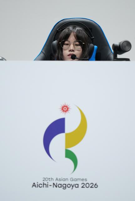 (260930) -- TOKONAME, Sept. 30, 2026 (Xinhua) -- Mu Xinyue of team China competes during the Quarterfinals between team China and team South Korea of 1v4 asymmetrical survival game [Identity V - Asian Games Version] of Esports at the 20th Asian Games Aichi-Nagoya 2026 in Tokoname of Aichi Prefecture, Japan, Sept. 30, 2026. (Xinhua/Wang Fei)