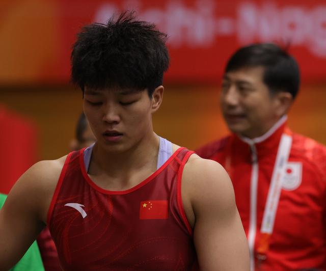 (260930) -- NAGOYA, Sept. 30, 2026 (Xinhua) -- Long Jia (front) of China reacts after competing with Ishii Ami of Japan during the Women's 68kg Semifinals of Wrestling at the 20th Asian Games Aichi-Nagoya 2026 in Nagoya, Japan, Sept. 30, 2026. (Xinhua/Li Bo)