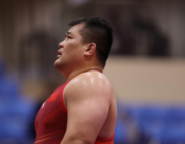 (260930) -- NAGOYA, Sept. 30, 2026 (Xinhua) -- Meng Lingzhe of China waits for the result of a challenge during the Men's Greco-Roman 130kg 1/4 Finals of Wrestling at the 20th Asian Games Aichi-Nagoya 2026 in Nagoya, Japan, Sept. 30, 2026. (Xinhua/Li Bo)