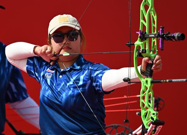 (260930) -- OKAZAKI, Sept. 30, 2026 (Xinhua) -- Kanoknapus Kaewchomphu of Thailand competes during the compound mixed team bronze medal match of archery between China and Thailand at the 20th Asian Games Aichi-Nagoya 2026 in Okazaki of Aichi Prefecture, Japan, Sept. 30, 2026. (Xinhua/Yu Yang)