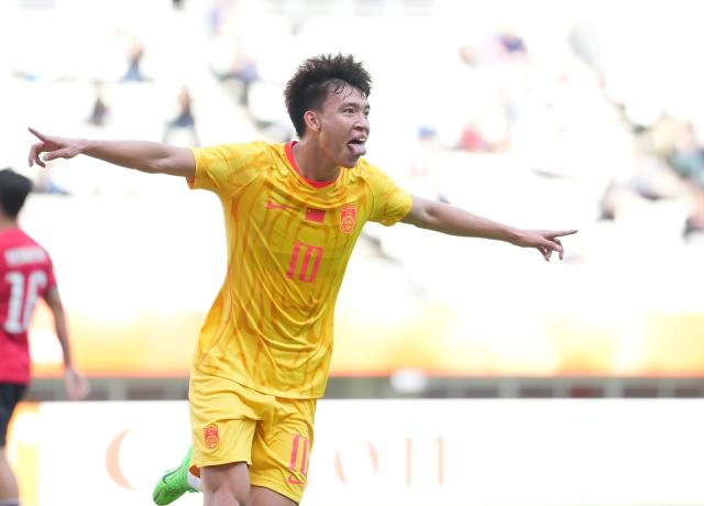 (260930) -- OSAKA, Sept. 30, 2026 (Xinhua) -- Wang Yudong of China celebrates his scoring during the men's semifinals of football between China and South Korea at 20th Asian Games Aichi-Nagoya 2026 in Osaka, Japan, Sept. 30, 2026. (Xinhua/Lui Siu Wai)