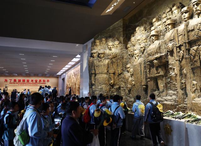 (260930) -- BEIJING, Sept. 30, 2026 (Xinhua) -- People visit the Museum of the War of the Chinese People's Resistance Against Japanese Aggression in Beijing, capital of China, Sept. 30, 2026. China observed its 13th Martyrs' Day on Wednesday with commemorations held here to honor fallen national heroes. (Xinhua/Zhang Chenlin)