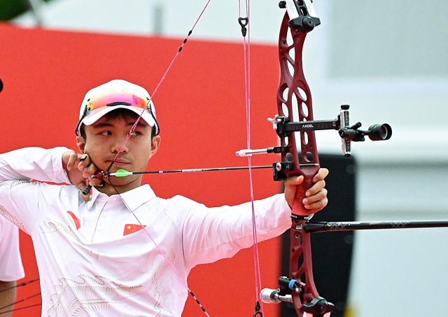 (260930) -- OKAZAKI, Sept. 30, 2026 (Xinhua) -- Liao Jiahao of team China competes during the compound men's team gold medal match of archery between China and India at the 20th Asian Games Aichi-Nagoya 2026 in Okazaki of Aichi Prefecture, Japan, Sept. 30, 2026. (Xinhua/Yu Yang)