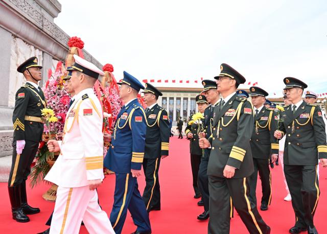 (260930) -- BEIJING, Sept. 30, 2026 (Xinhua) -- A ceremony to present flower baskets to fallen national heroes to mark Martyrs' Day is held at Tian'anmen Square in Beijing, capital of China, Sept. 30, 2026. (Xinhua/Yue Yuewei)