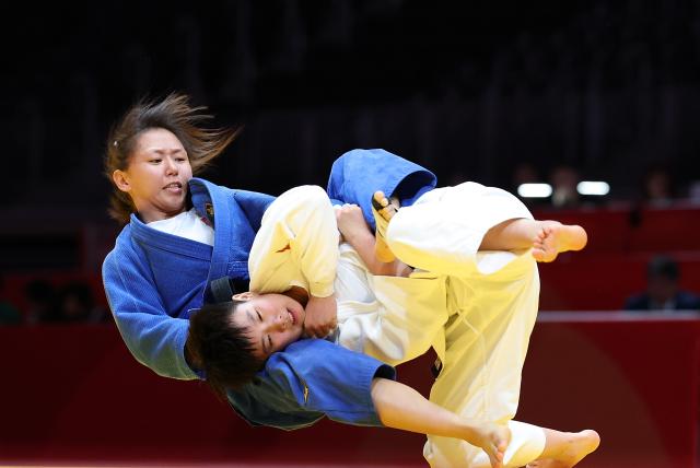 (260930) -- NAGOYA, Sept. 30, 2026 (Xinhua) -- Xu Aoyu (R) of China competes against Uranzaya Bayanmunkh of Mongolia during the Women's -52kg bronze medal match of Judo at the 20th Asian Games Aichi-Nagoya 2026 in Nagoya, Japan, Sept. 30, 2026. (Xinhua/Yao Qilin)
