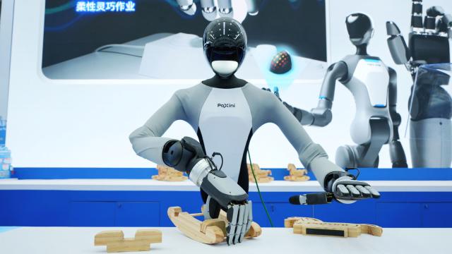 (260930) -- TIANJIN, Sept. 30, 2026 (Xinhua) -- A robot exhibit from PaXini AI conducts a toy assembling challenge at the 2026 World Robot Conference in Beijing, capital of China, Aug. 19, 2026. TO GO WITH "China Focus: Innovative applications drive healthy growth of China's private economy" (Xinhua)