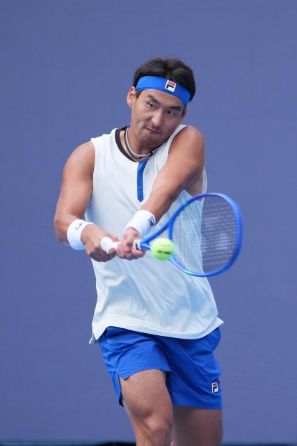 (260930) -- BEIJING, Sept. 30, 2026 (Xinhua) -- Bu Yunchaokete of China hits a return during the men's singles first round match against Juan Manuel Cerundolo of Argentina at 2026 China Open tennis tournament in Beijing, China, Sept. 30, 2026. (Xinhua/Xie Han)