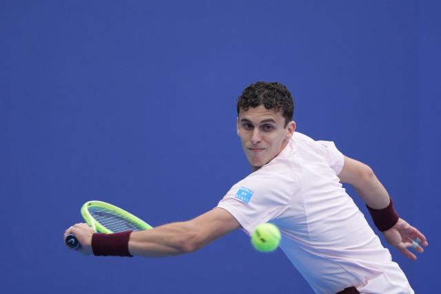 (260930) -- BEIJING, Sept. 30, 2026 (Xinhua) -- Juan Manuel Cerundolo of Argentina hits a return during the men's singles first round match against Bu Yunchaokete of China at 2026 China Open tennis tournament in Beijing, China, Sept. 30, 2026. (Xinhua/Xie Han)